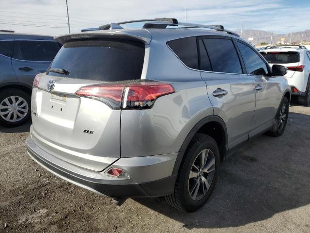 Photo 4 from auction – 2016 TOYOTA RAV4 XLE with VIN 2T3WFREV7GW255901