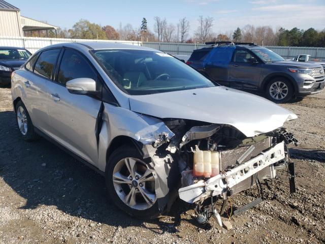FORD FOCUS SE 2014 with VIN 1FADP3F23EL135797 - Photo from auction