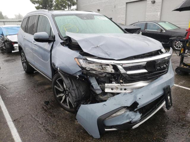 HONDA PILOT TOUR 2022 with VIN 5FNYF5H64NB020249 - Photo from auction