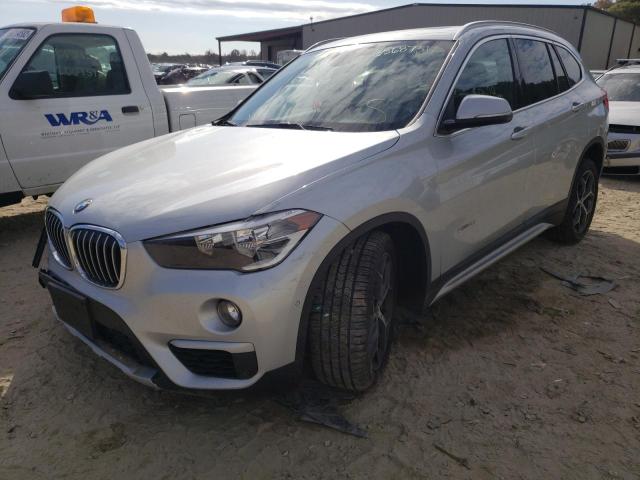 Photo 2 from auction – 2018 BMW X1 XDRIVE2 with VIN WBXHT3C31J5K27478