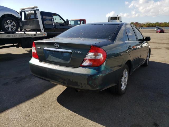 Photo 4 from auction – 2002 TOYOTA CAMRY LE with VIN JTDBE32K320076339