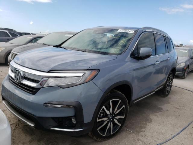 Photo 2 from auction – 2022 HONDA PILOT ELIT with VIN 5FNYF6H07NB047981