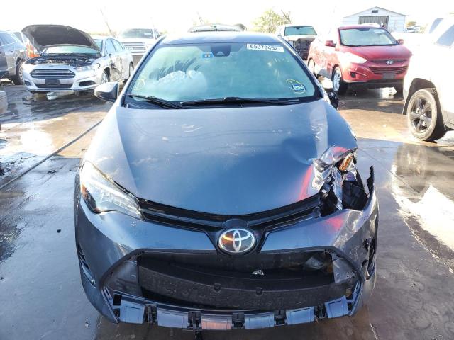 Photo 5 from auction – 2018 TOYOTA COROLLA with VIN 5YFBURHE5JP835763
