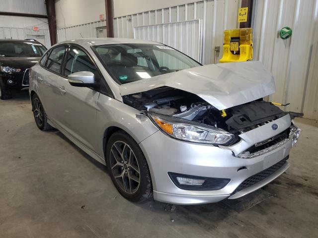 FORD FOCUS SE 2015 with VIN 1FADP3F23FL208328 - Photo from auction