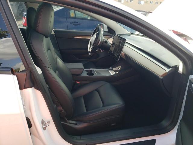 Photo 5 from auction – 2021 TESLA MODEL 3 with VIN 5YJ3E1EA7MF095119