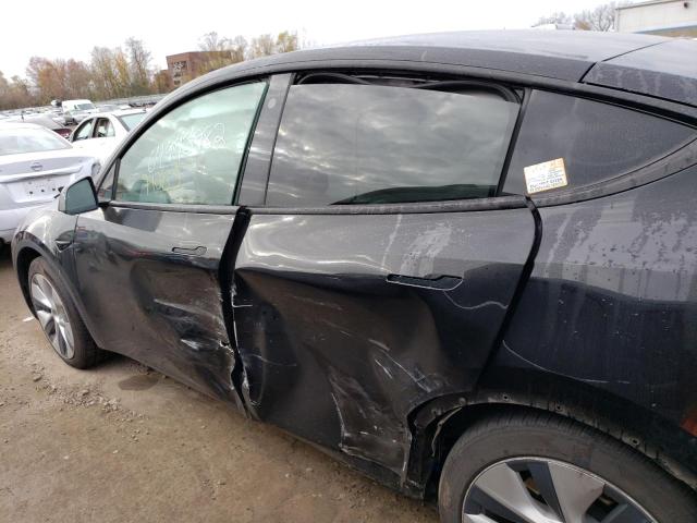 Photo 9 from auction – 2021 TESLA MODEL Y with VIN 5YJYGAEE7MF235544