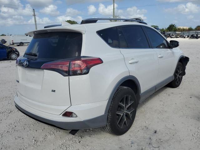 Photo 4 from auction – 2018 TOYOTA RAV4 SE with VIN 2T3NFREV1JW454218