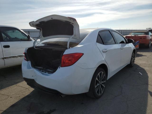 Photo 4 from auction – 2017 TOYOTA COROLLA L with VIN 5YFBURHE5HP654740