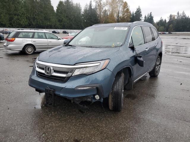 Photo 2 from auction – 2022 HONDA PILOT ELIT with VIN 5FNYF6H06NB008802