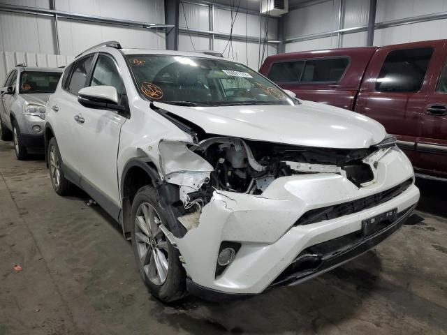 Photo 1 from auction – 2018 TOYOTA RAV4 LIMIT with VIN 2T3DFREV5JW755411