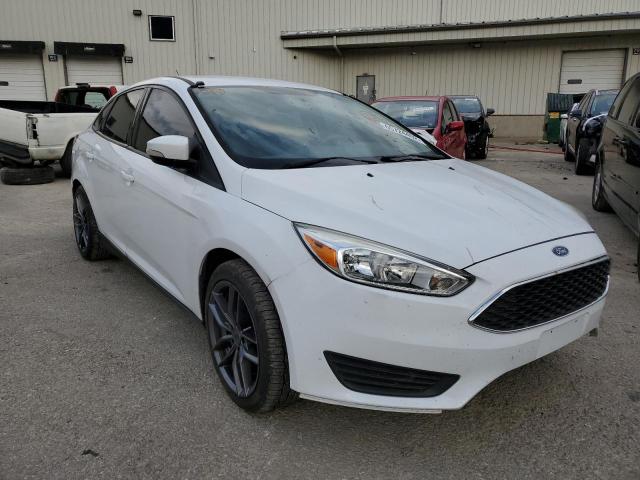 FORD FOCUS SE 2016 with VIN 1FADP3F21GL373134 - Photo from auction