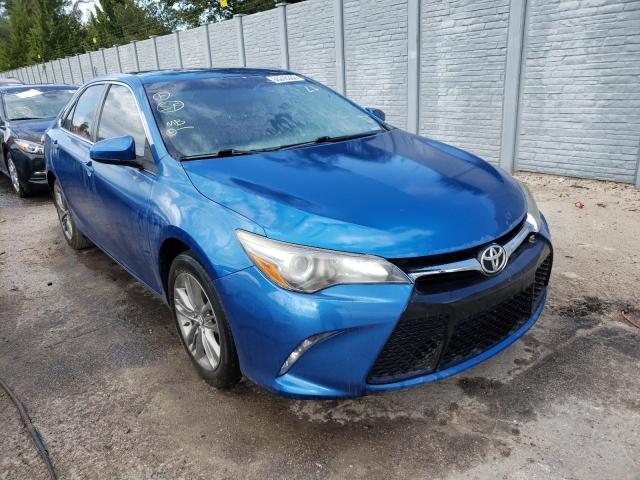 TOYOTA CAMRY LE 2017 with VIN 4T1BF1FKXHU674484 - Photo from auction