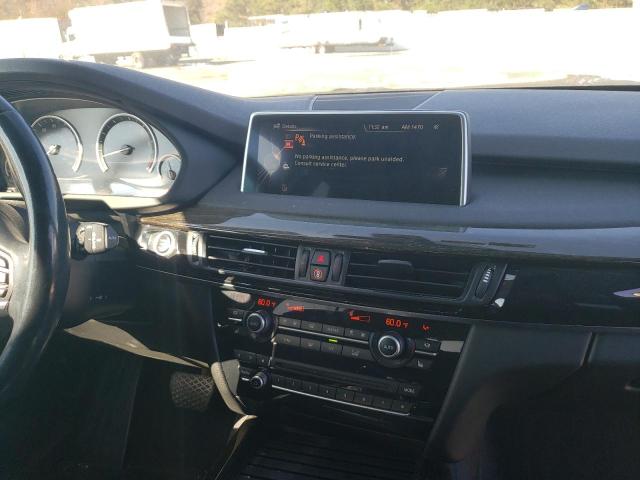 Photo 9 from auction – 2014 BMW X5 XDRIVE3 with VIN 5UXKR0C5XE0K50423