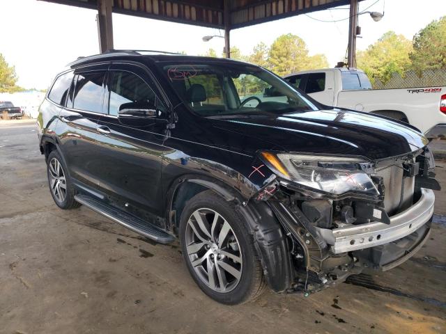 HONDA PILOT ELIT 2017 with VIN 5FNYF6H01HB006055 - Photo from auction