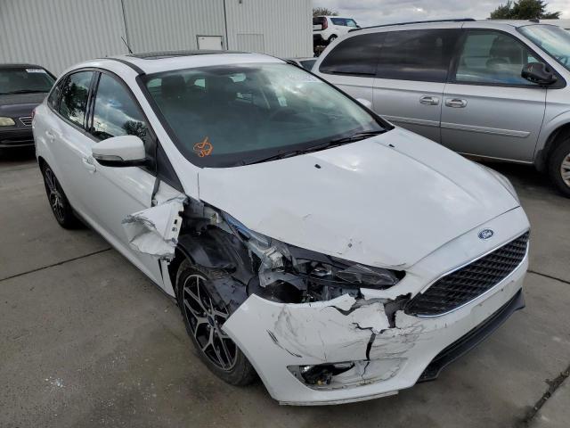 FORD FOCUS SEL 2018 with VIN 1FADP3H2XJL261128 - Photo from auction