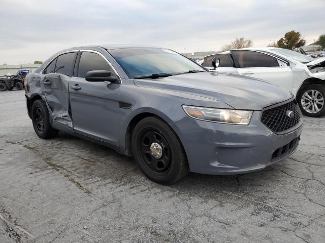 FORD TAURUS POL 2014 with VIN 1FAHP2L80EG159780 - Photo from auction
