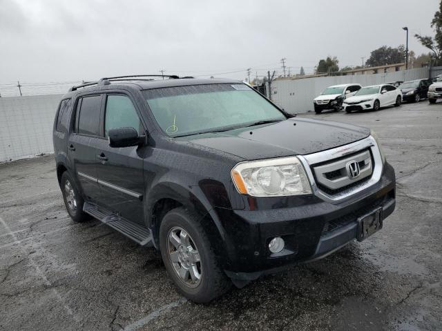 HONDA PILOT TOUR 2011 with VIN 5FNYF4H97BB079201 - Photo from auction