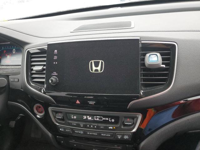 Photo 9 from auction – 2020 HONDA PILOT TOUR with VIN 5FNYF5H97LB012346