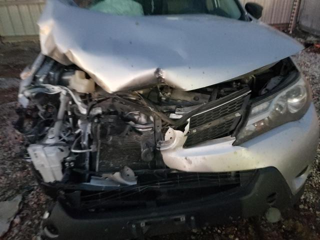 Photo 7 from auction – 2014 TOYOTA RAV4 LE with VIN JTMZFREV7EJ006409