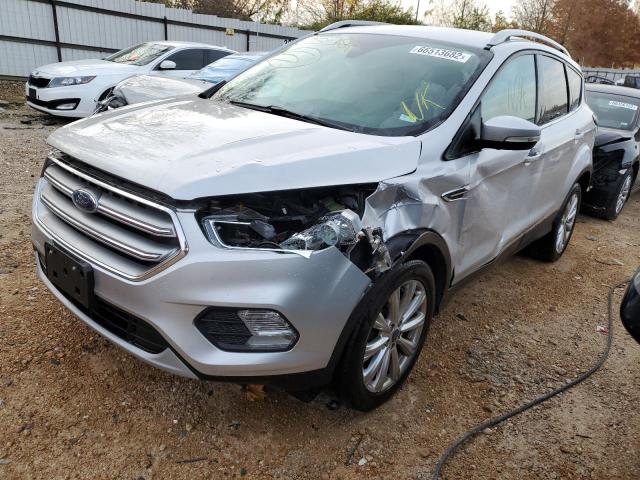 Photo 2 from auction – 2017 FORD ESCAPE TIT with VIN 1FMCU0J99HUC14354