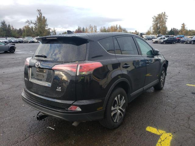 Photo 4 from auction – 2018 TOYOTA RAV4 LE with VIN 2T3BFREV0JW775783