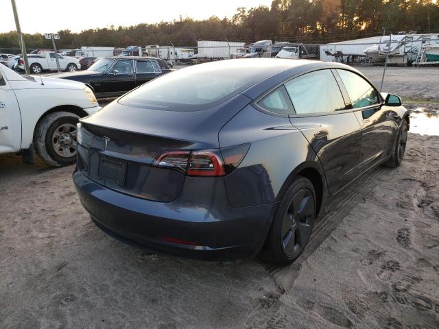 Photo 4 from auction – 2021 TESLA MODEL 3 with VIN 5YJ3E1EA4MF090038