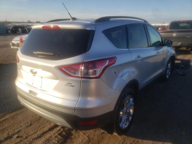 Photo 4 from auction – 2016 FORD ESCAPE SE with VIN 1FMCU9G9XGUC11036