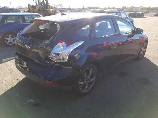 Photo 4 from auction – 2014 FORD FOCUS SE with VIN 1FADP3K29EL169670