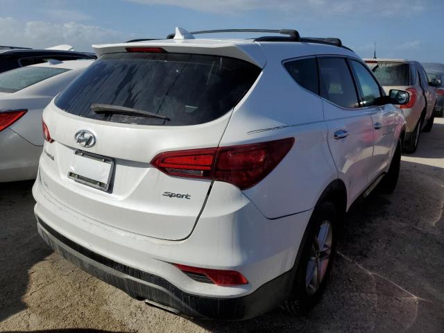 Photo 4 from auction – 2017 HYUNDAI SANTA FE S with VIN 5NMZU3LB1HH028976