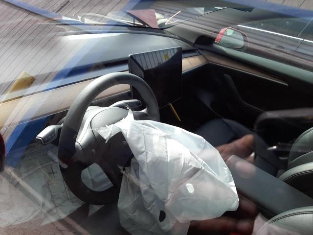 Photo 8 from auction – 2022 TESLA MODEL 3 with VIN 5YJ3E1EAXNF185379