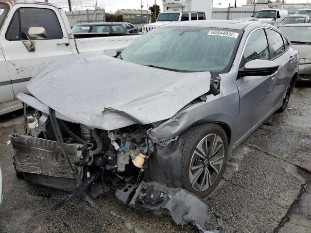Photo 2 from auction – 2017 HONDA CIVIC EX with VIN 2HGFC1F36HH641123