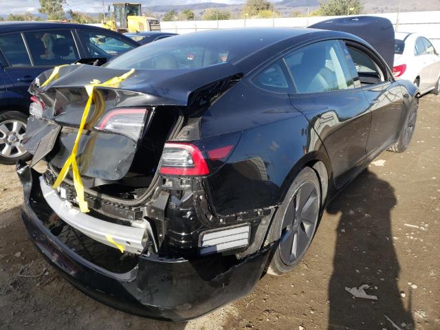 Photo 4 from auction – 2021 TESLA MODEL 3 with VIN 5YJ3E1EA8MF997858