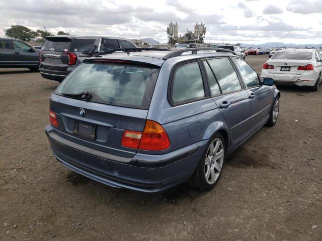 Photo 4 from auction – 2000 BMW 323 IT with VIN WBAAR3348YJM00398
