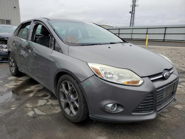 FORD FOCUS SE 2014 with VIN 1FADP3F20EL162312 - Photo from auction