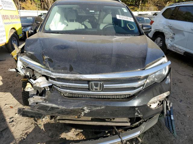 Photo 7 from auction – 2017 HONDA PILOT TOUR with VIN 5FNYF5H93HB000718