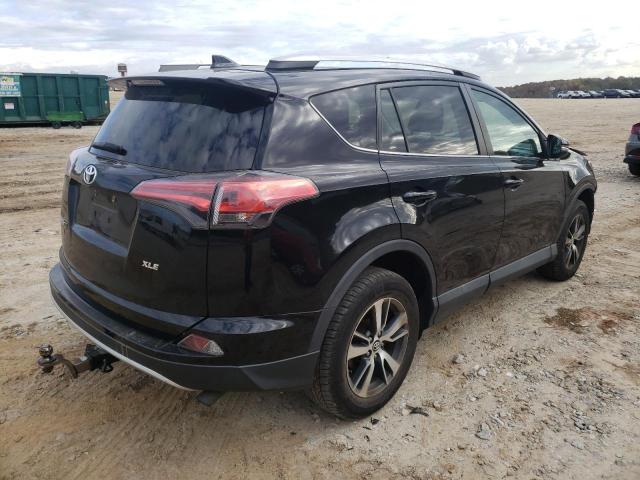 Photo 4 from auction – 2016 TOYOTA RAV4 XLE with VIN 2T3WFREV9GW307044