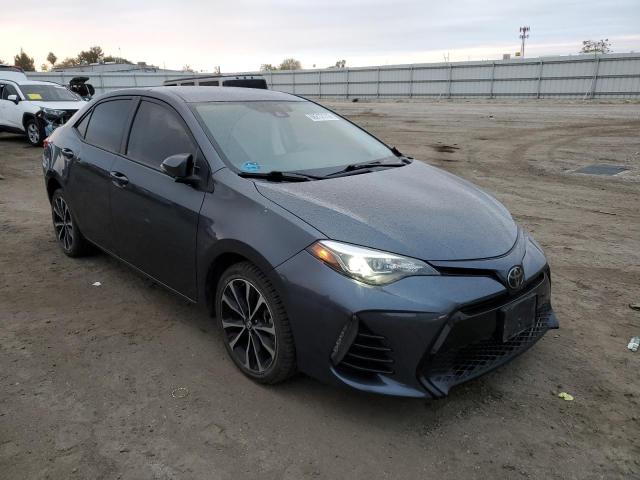 TOYOTA COROLLA L 2017 with VIN 5YFBURHE5HP647562 - Photo from auction