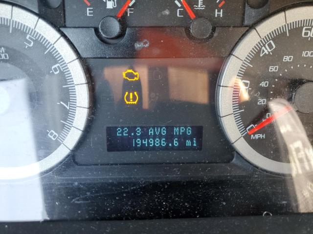 Photo 8 from auction – 2009 FORD ESCAPE LIM with VIN 1FMCU04G79KA57740