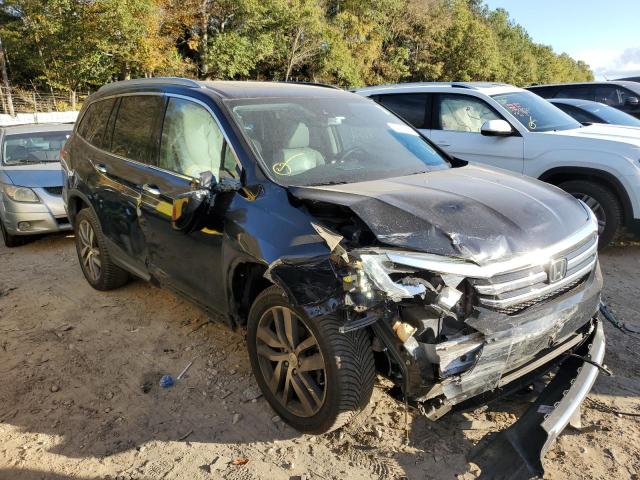 HONDA PILOT TOUR 2017 with VIN 5FNYF5H93HB000718 - Photo from auction