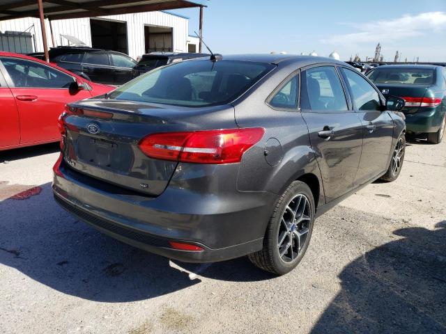 Photo 4 from auction – 2018 FORD FOCUS SE with VIN 1FADP3F28JL319207