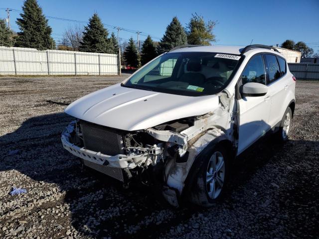 Photo 2 from auction – 2016 FORD ESCAPE SE with VIN 1FMCU9GX2GUC32395