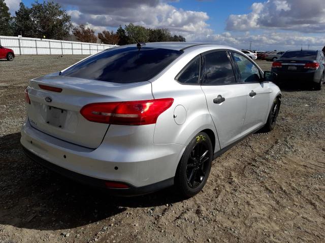 Photo 4 from auction – 2016 FORD FOCUS S with VIN 1FADP3E27GL353018