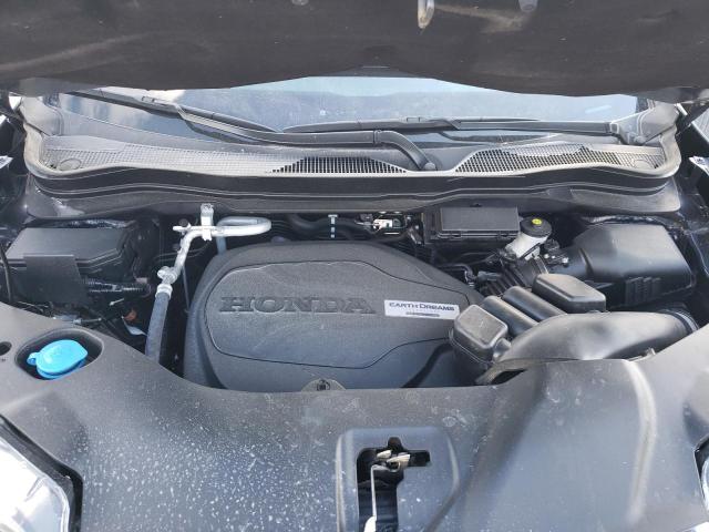 Photo 7 from auction – 2021 HONDA PILOT TOUR with VIN 5FNYF5H93MB000924
