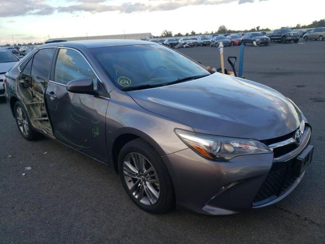TOYOTA CAMRY LE 2017 with VIN 4T1BF1FKXHU671648 - Photo from auction