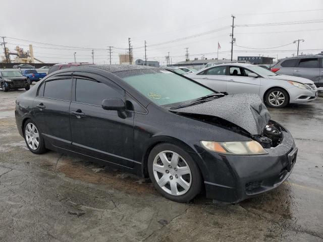 HONDA CIVIC LX 2011 with VIN 2HGFA1F50BH301657 - Photo from auction