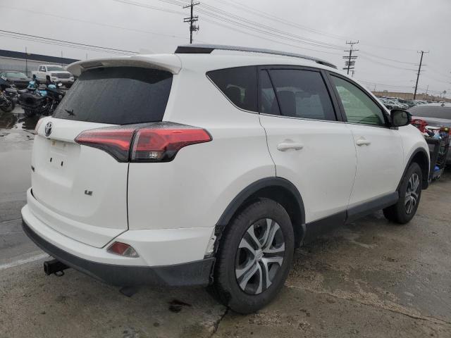 Photo 4 from auction – 2018 TOYOTA RAV4 LE with VIN JTMZFREV4JJ746705
