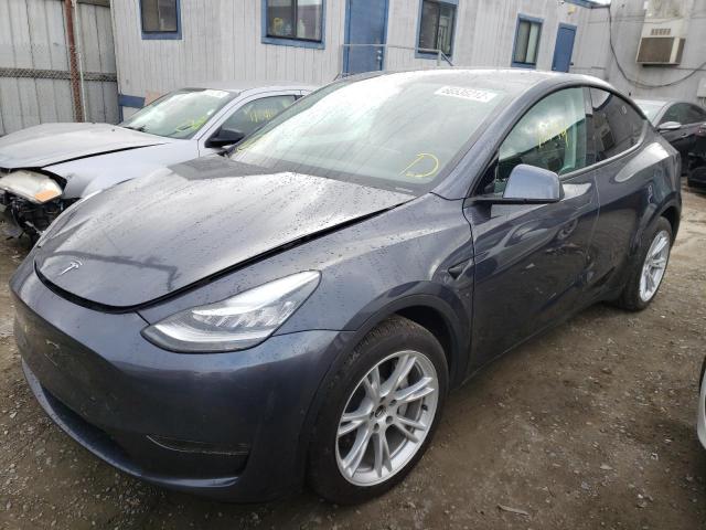 Photo 2 from auction – 2021 TESLA MODEL Y with VIN 5YJYGDEE7MF274037