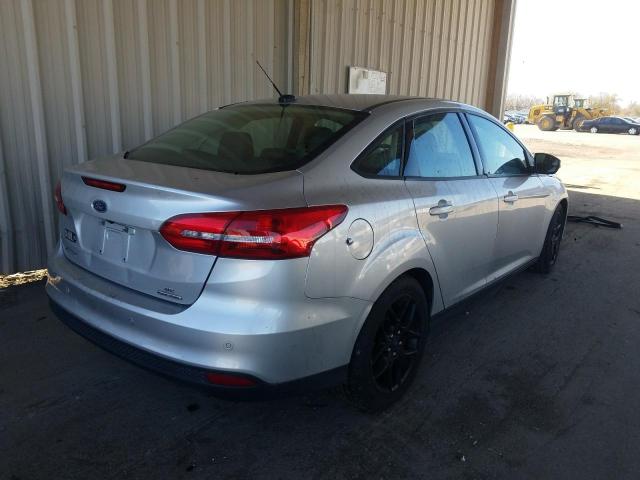 Photo 4 from auction – 2016 FORD FOCUS SE with VIN 1FADP3F26GL386414