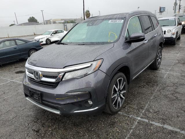 Photo 2 from auction – 2020 HONDA PILOT TOUR with VIN 5FNYF5H97LB012346