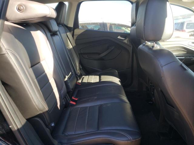 Foto 6 de la subasta – 2016 FORD ESCAPE TIT con VIN 1FMCU9J90GUC15962